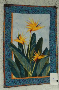quilted wall art composed of Bird of Paradise flowers